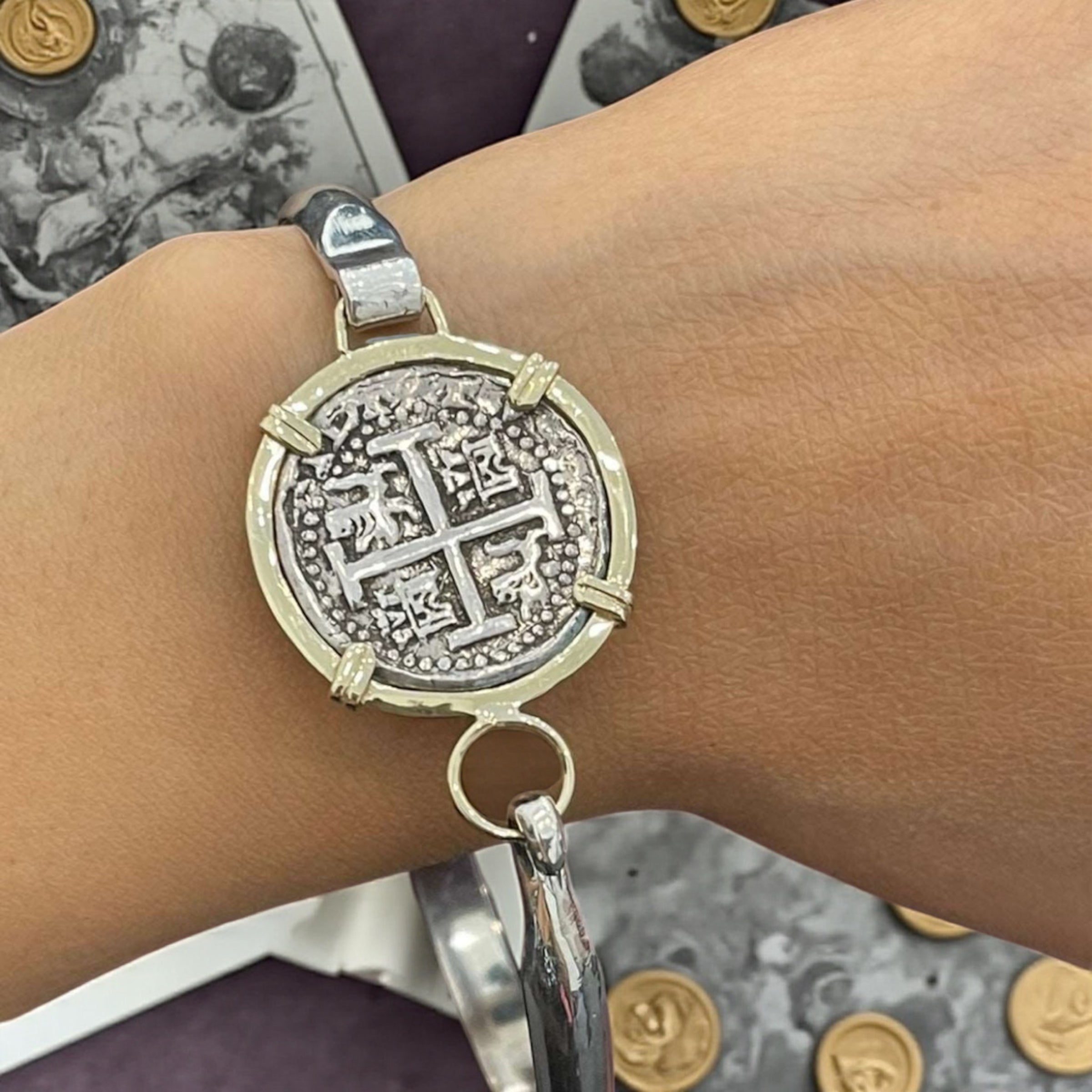 ATOCHA SOLID SILVER COIN BANGLE BEZELED WITH 14k SOLID GOLD