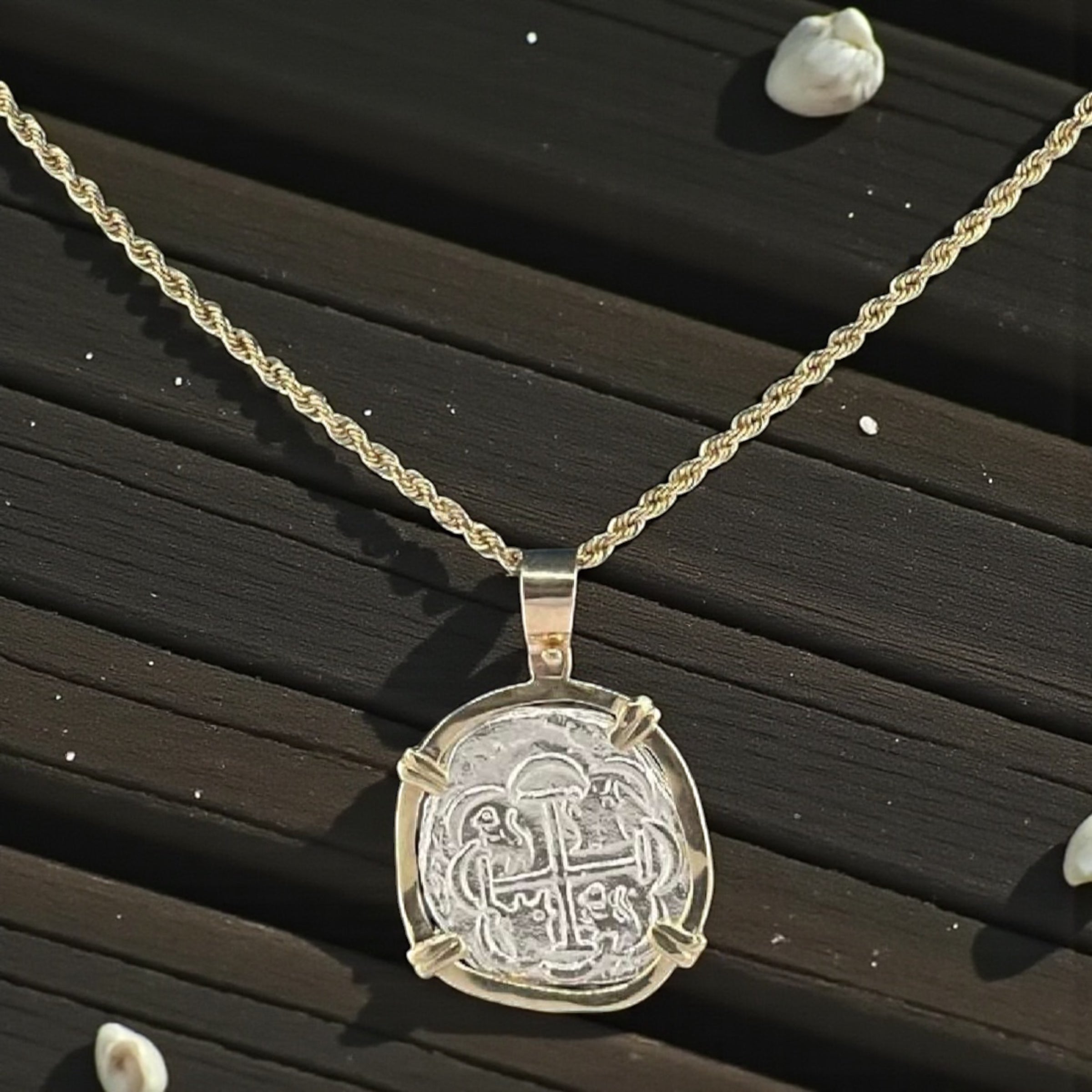 NUESTRA SENORA DE ATOCHA  SILVER COIN PENDANT IN 14KT GOLD BEZEL