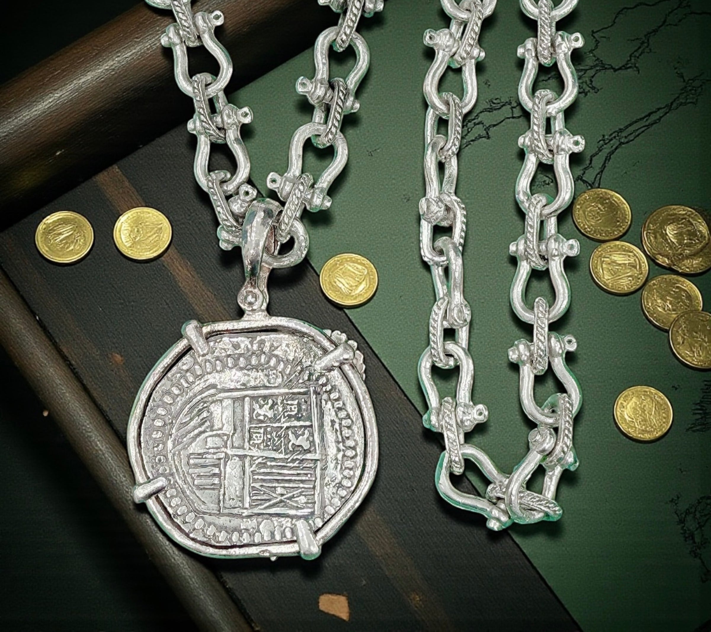 ATOCHA LARGE SILVER COIN PENDANT IN FISH BEZEL