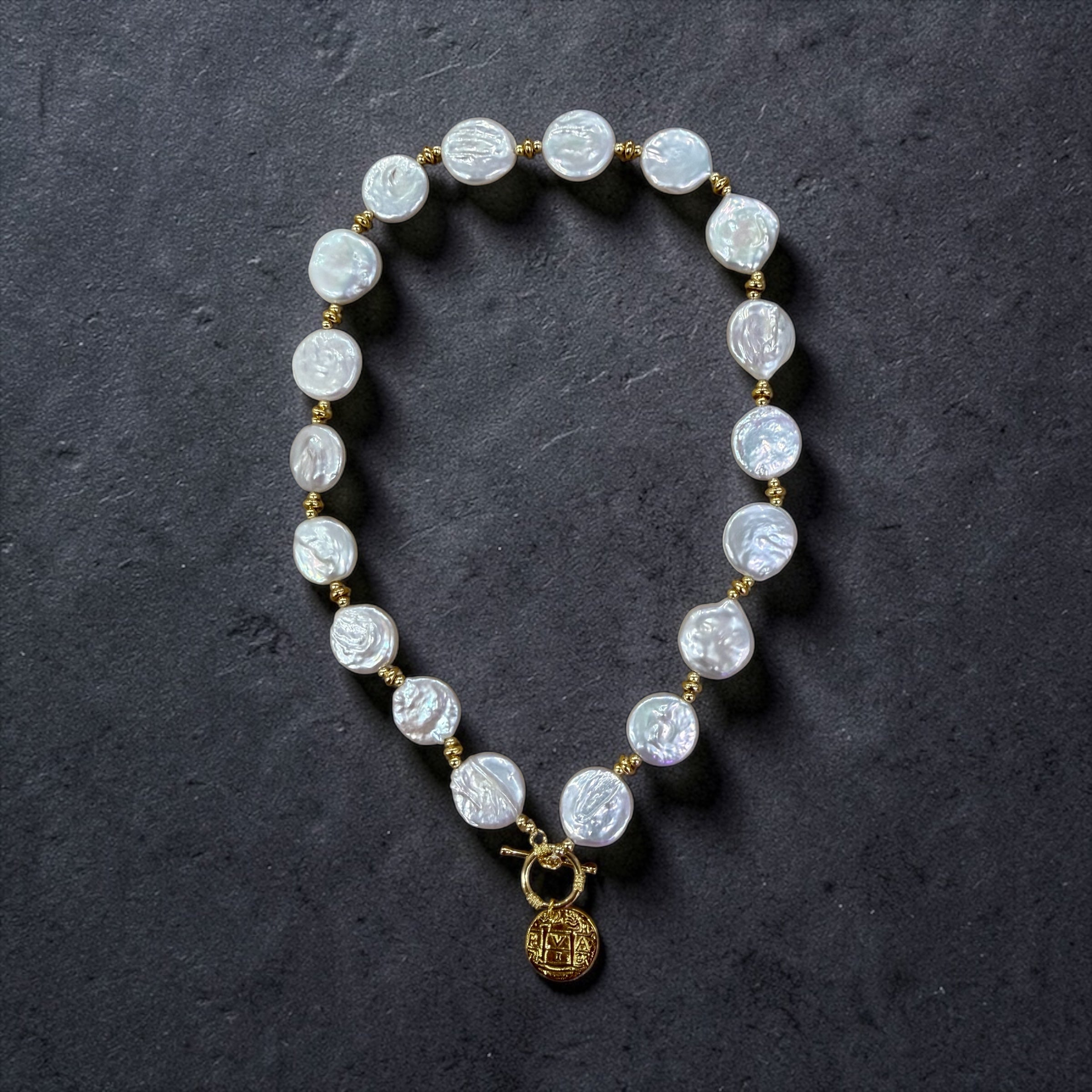 Beautiful Coin Pearl toggle necklace on atocha silver coin charm