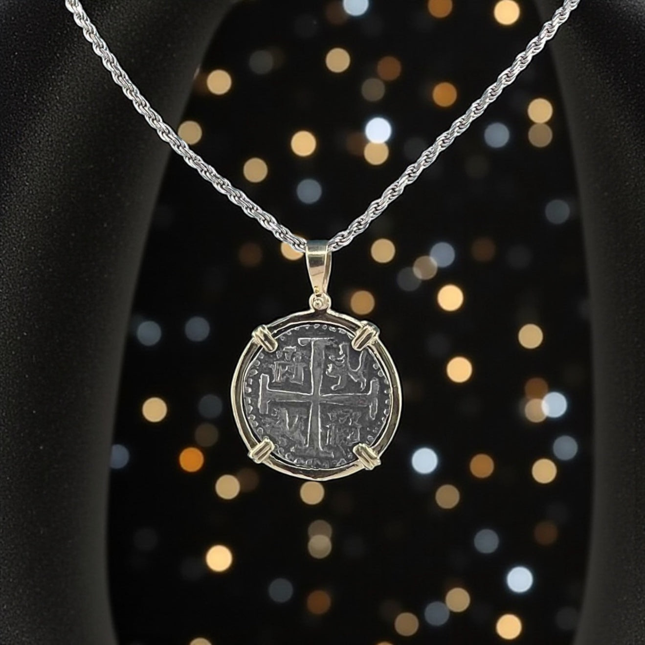 NUESTRA SENORA DE ATOCHA  SILVER COIN PENDANT IN 14KT GOLD BEZEL