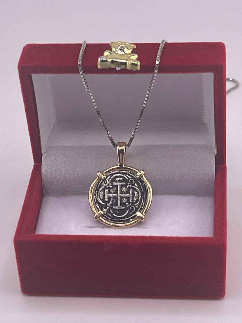 NUESTRA SENORA DE ATOCHA  SILVER COIN PENDANT IN 14KT GOLD BEZEL