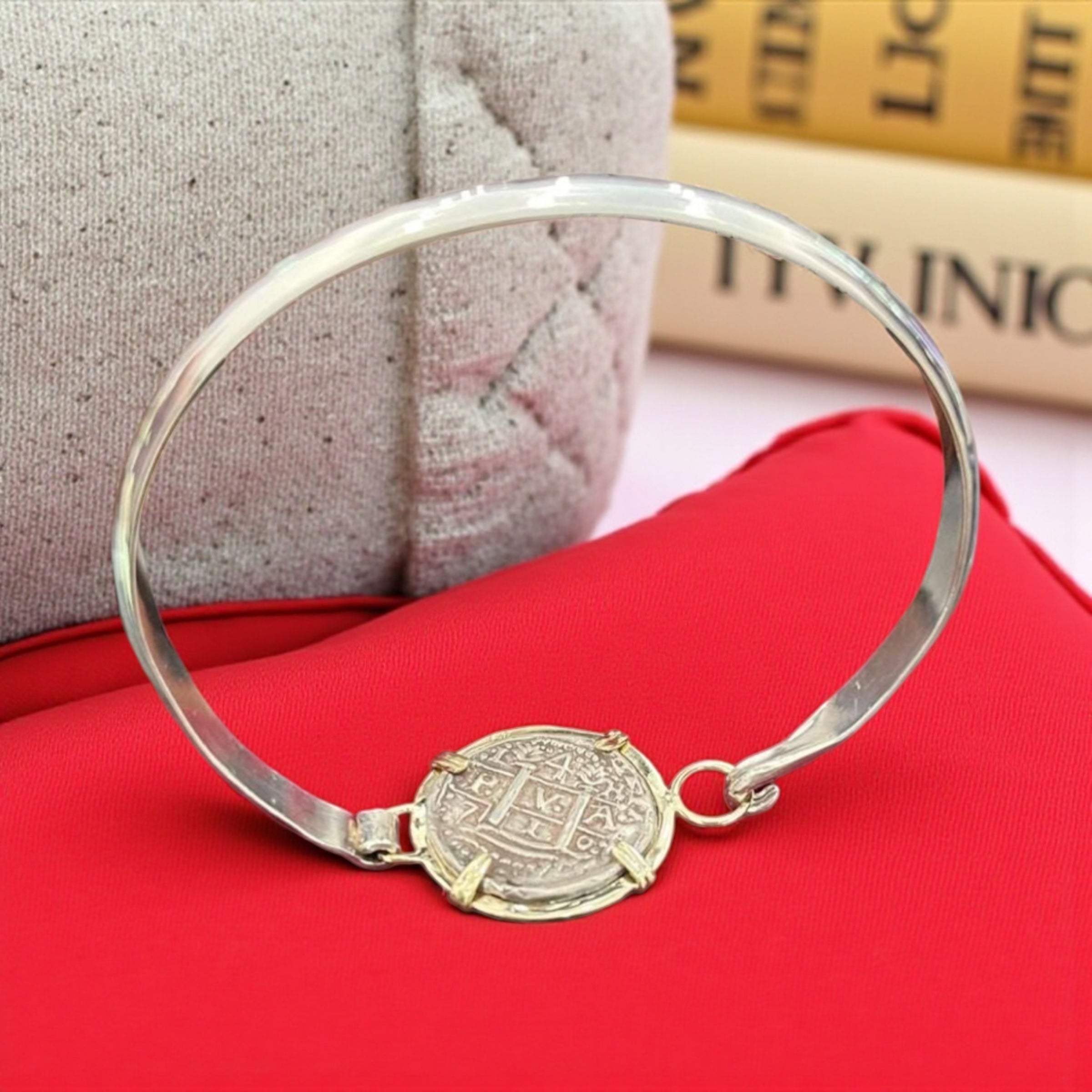 ATOCHA SOLID SILVER COIN BANGLE BEZELED WITH 14k SOLID GOLD