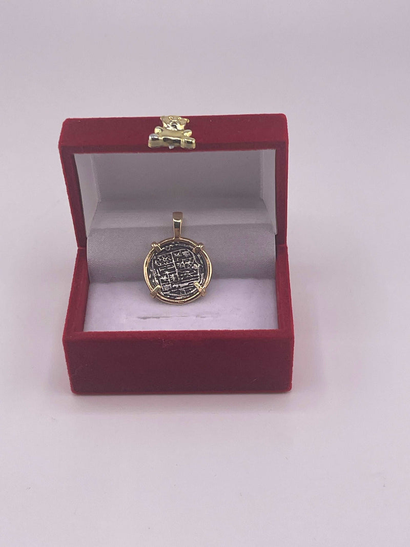 NUESTRA SENORA DE ATOCHA  SILVER COIN PENDANT IN 14KT GOLD BEZEL