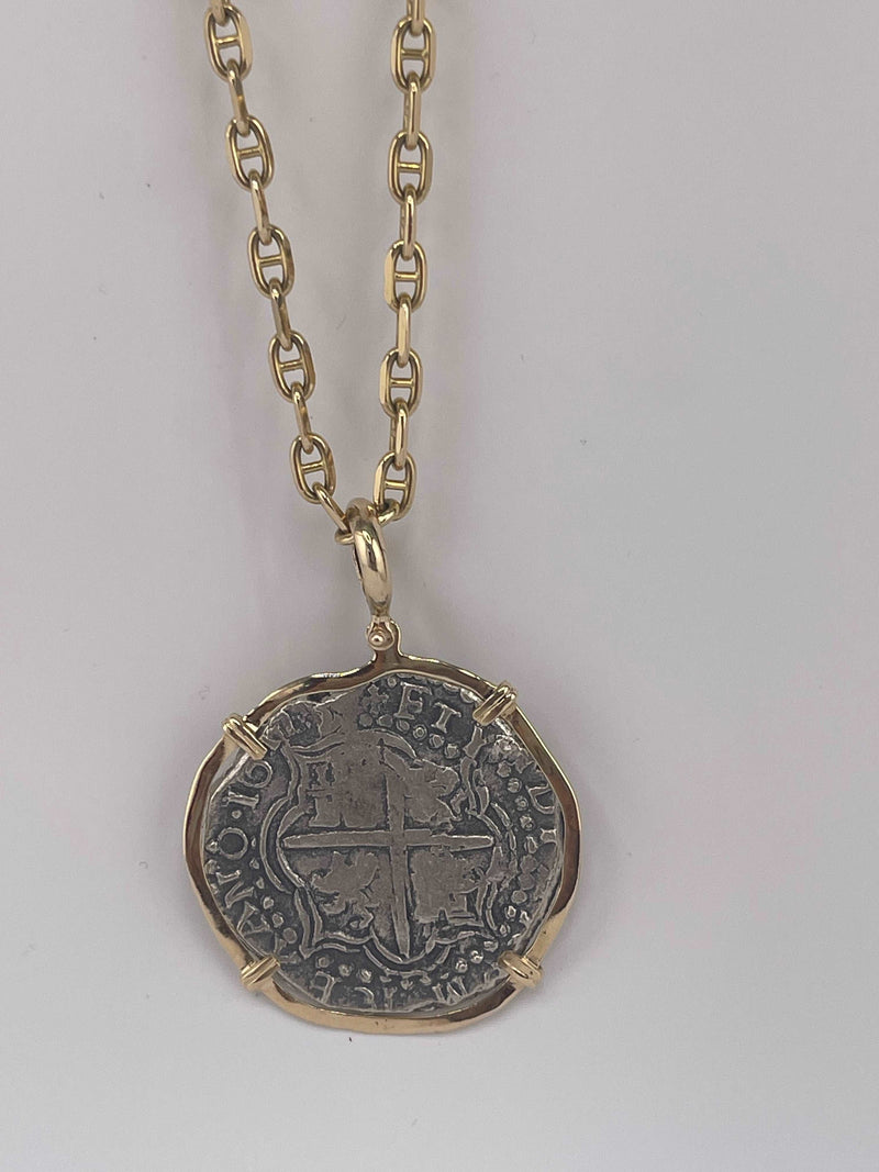 NUESTRA SENORA DE ATOCHA SOLID LARGE SIZE SILVER COIN PENDANT IN 14KT SOLID GOLD BEZEL