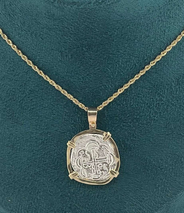 NUESTRA SENORA DE ATOCHA  SILVER COIN PENDANT IN 14KT GOLD BEZEL