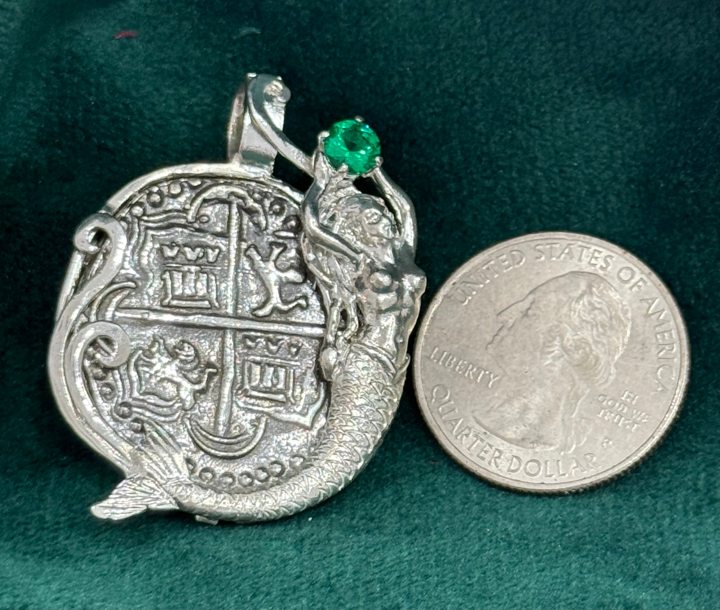 Atocha shipwreck silver coin pendant in mermaid bezel holding emerald
