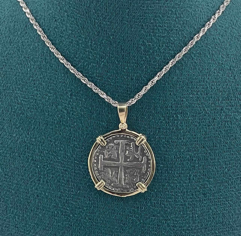 NUESTRA SENORA DE ATOCHA  SILVER COIN PENDANT IN 14KT GOLD BEZEL