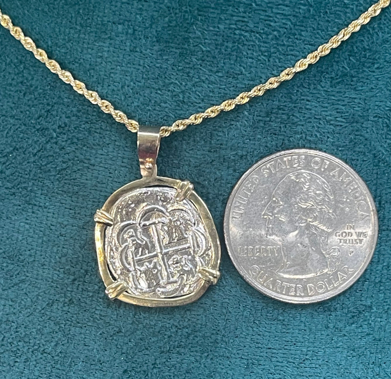 NUESTRA SENORA DE ATOCHA  SILVER COIN PENDANT IN 14KT GOLD BEZEL