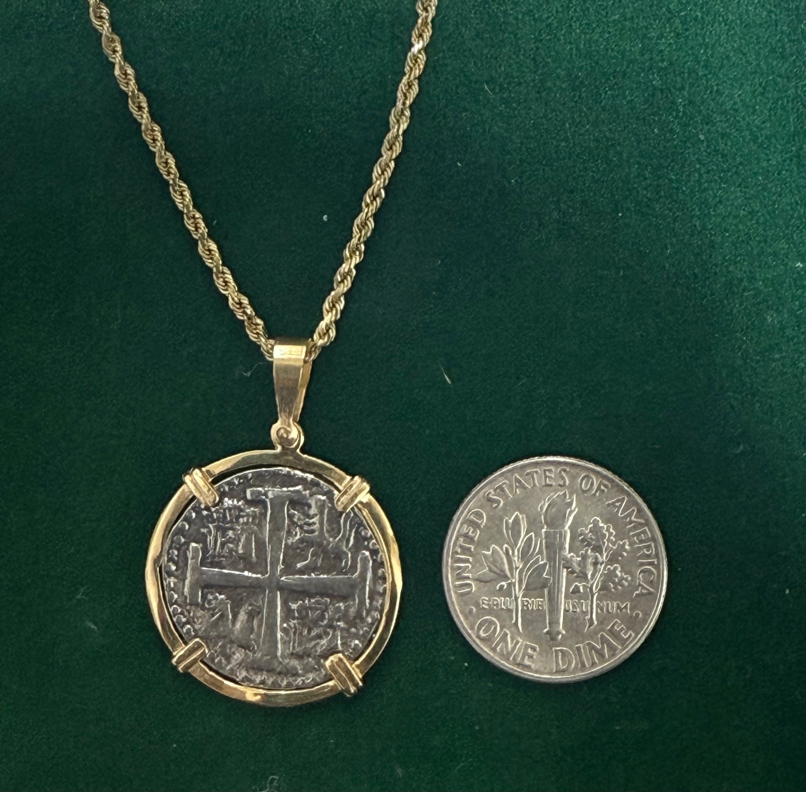 NUESTRA SENORA DE ATOCHA SILVER COIN PENDANT IN 14KT GOLD BEZEL