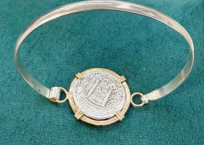 ATOCHA SOLID SILVER COIN BANGLE BEZELED WITH 14k SOLID GOLD BEZEL