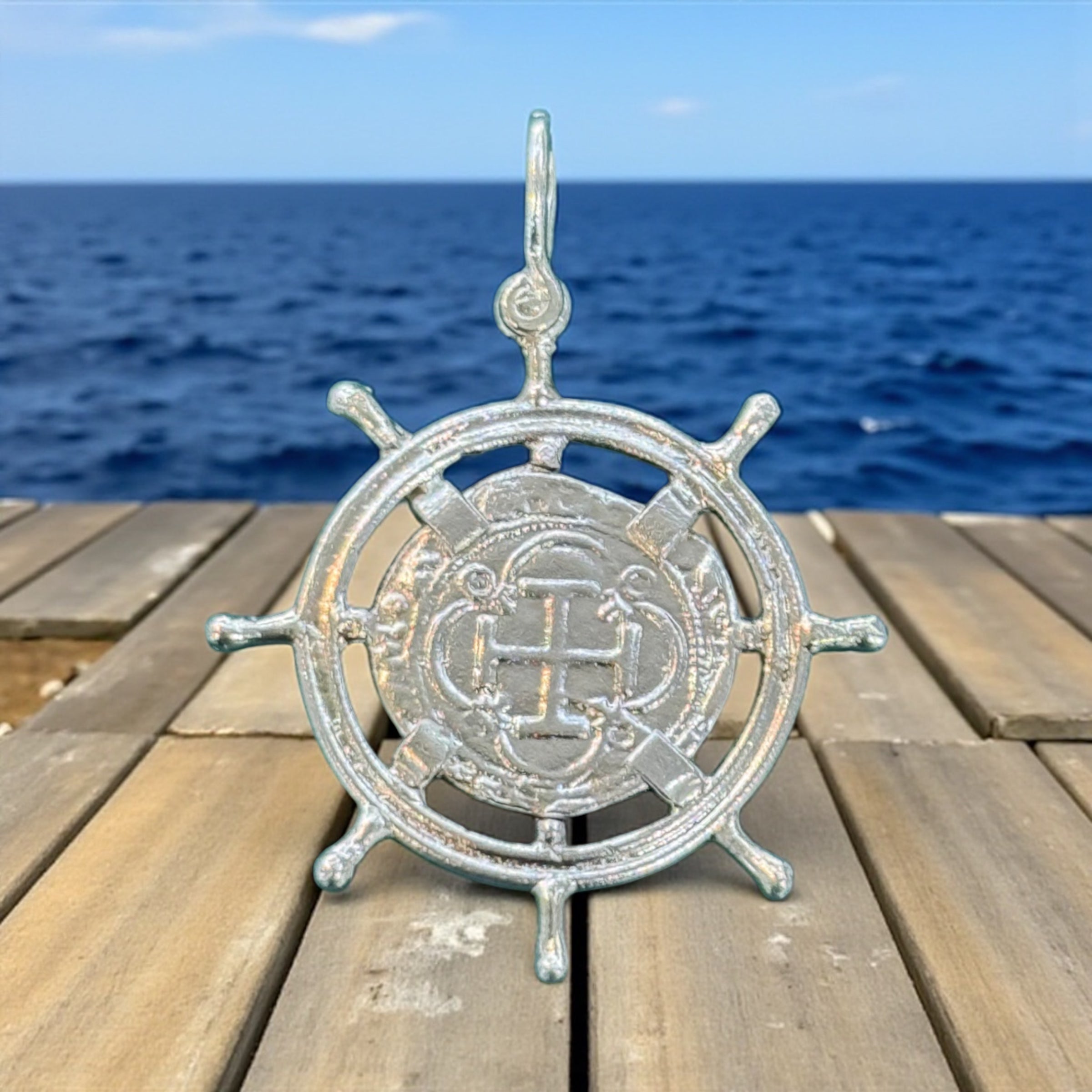 ATOCHA SILVER SHIPS-WHEEL COIN PENDANT