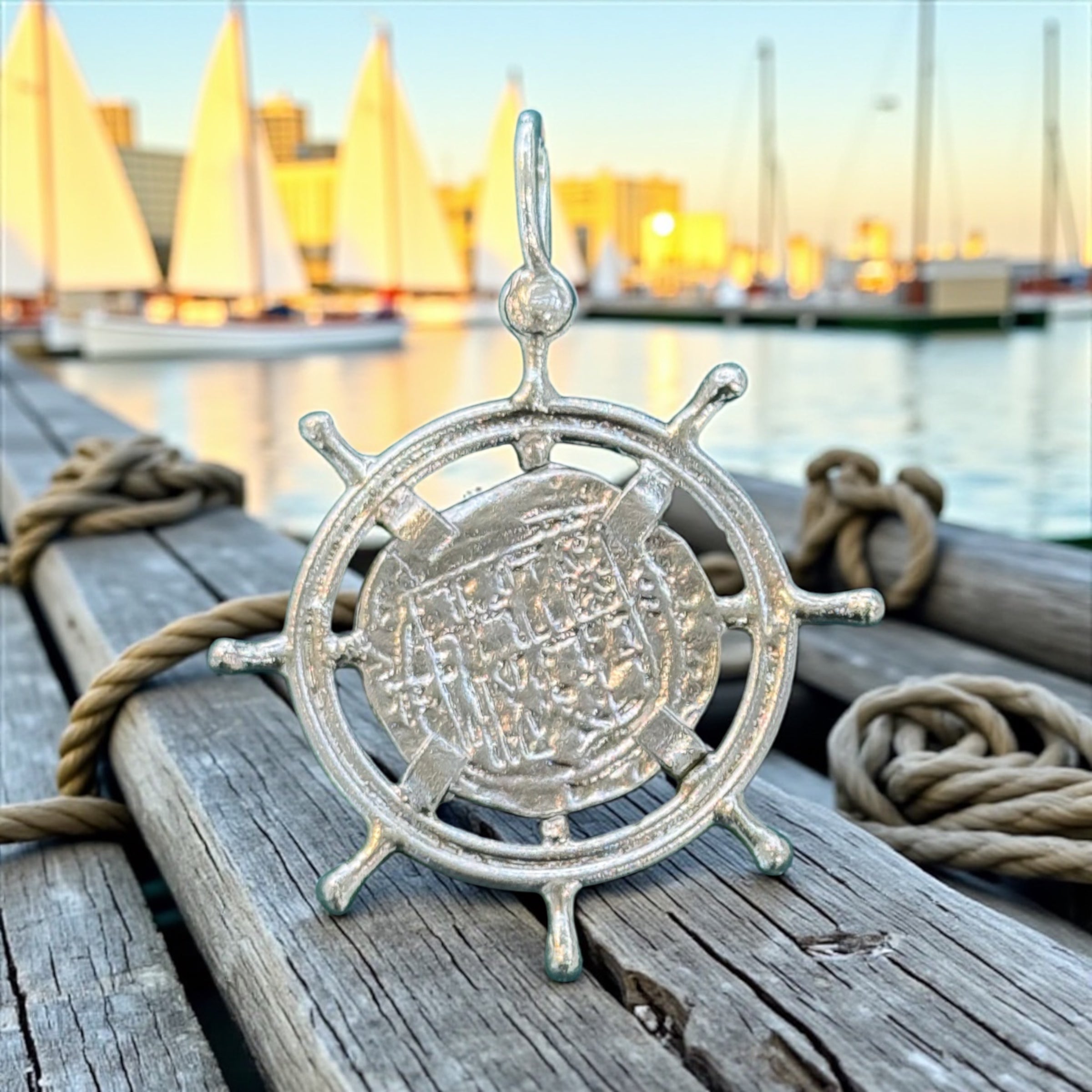 ATOCHA SILVER SHIPS-WHEEL COIN PENDANT