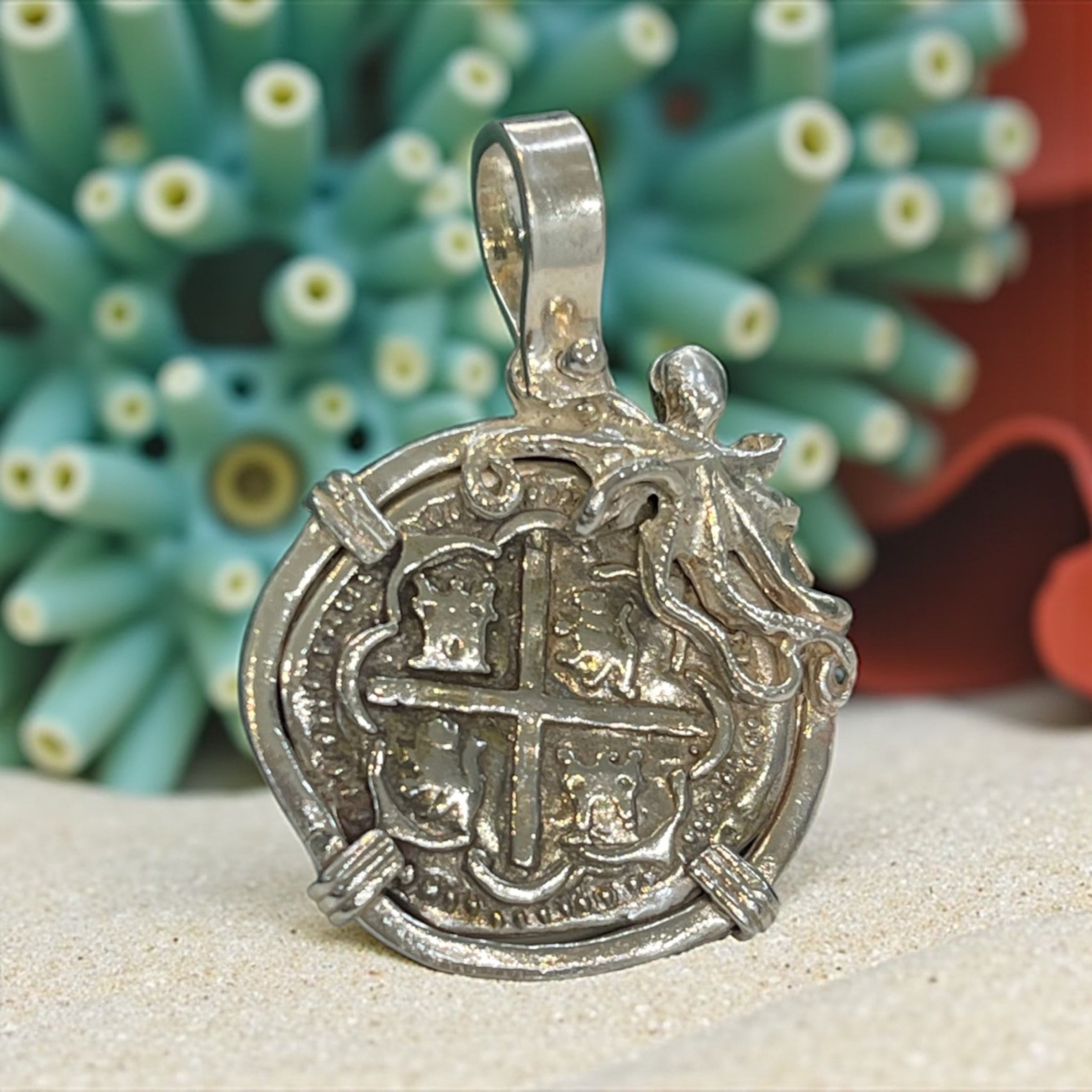 ATOCHA SOLID SILVER COIN PENDANT IN BEAUTIFUL OCTOPUS BEZEL