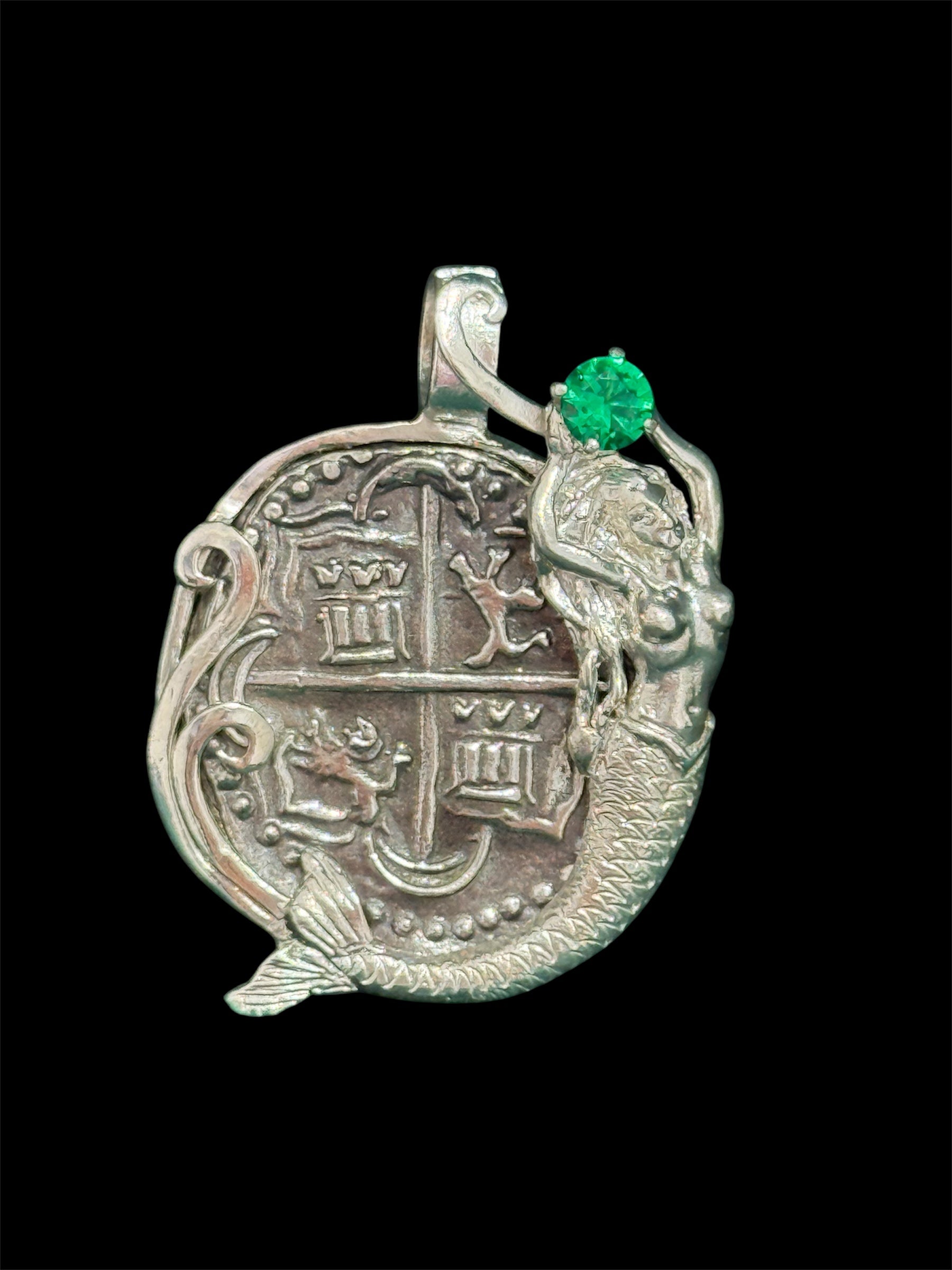 Atocha shipwreck silver coin pendant in mermaid bezel holding emerald
