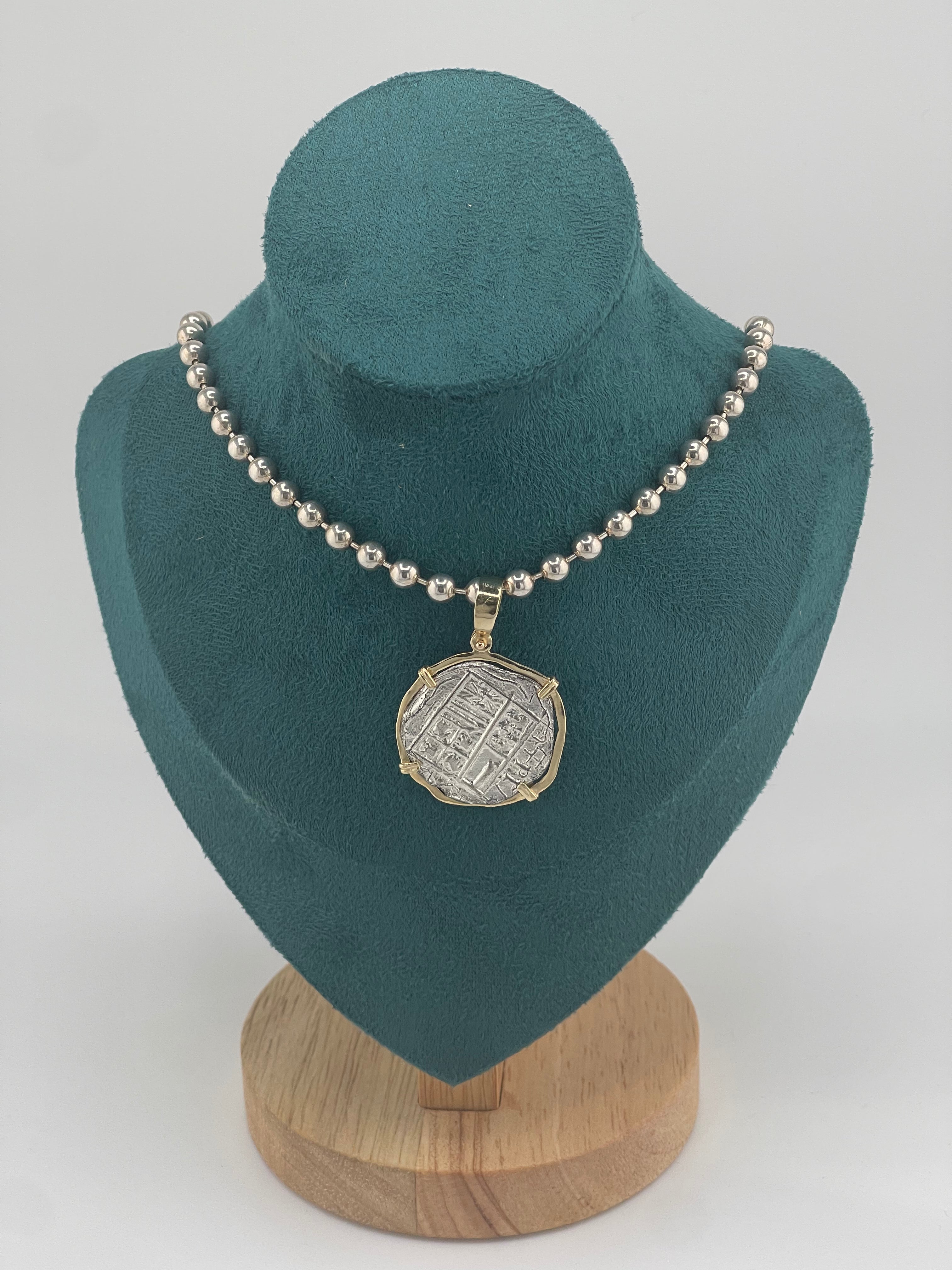 NUESTRA SENORA DE ATOCHA SILVER COIN PENDANT IN 14KT SOLID GOLD BEZEL WITH 925 STERLING SILVER BEAD CHAIN 18” LONG