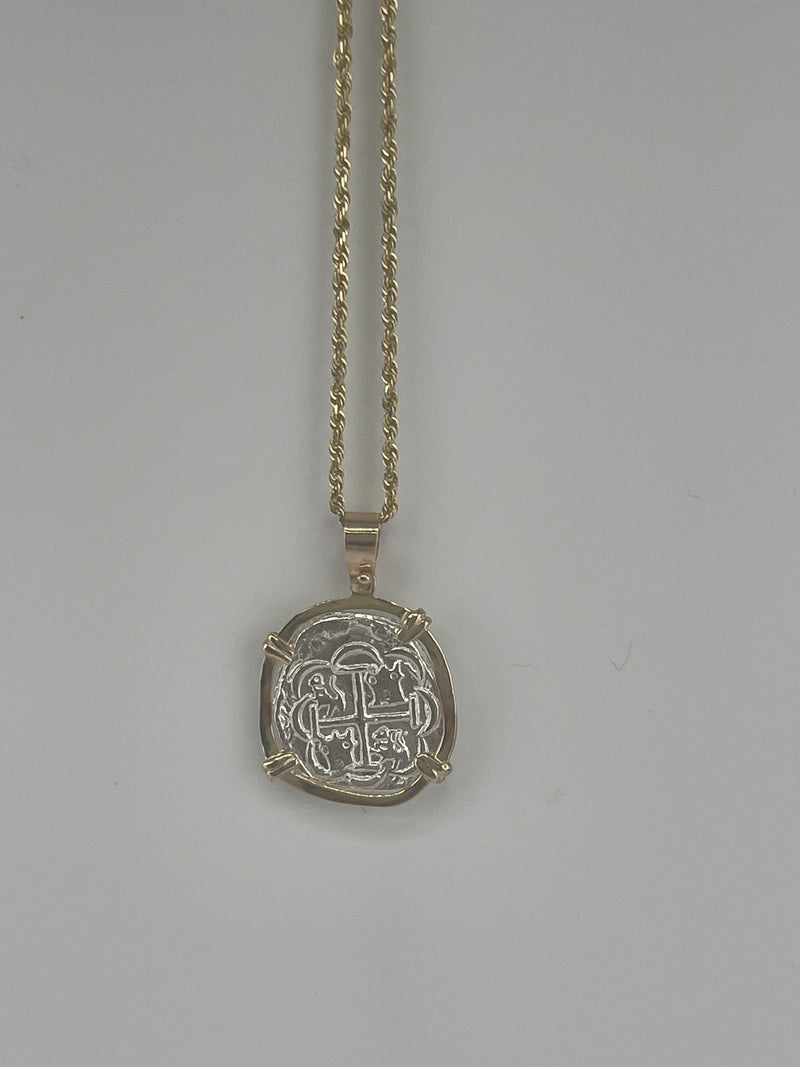 NUESTRA SENORA DE ATOCHA  SILVER COIN PENDANT IN 14KT GOLD BEZEL