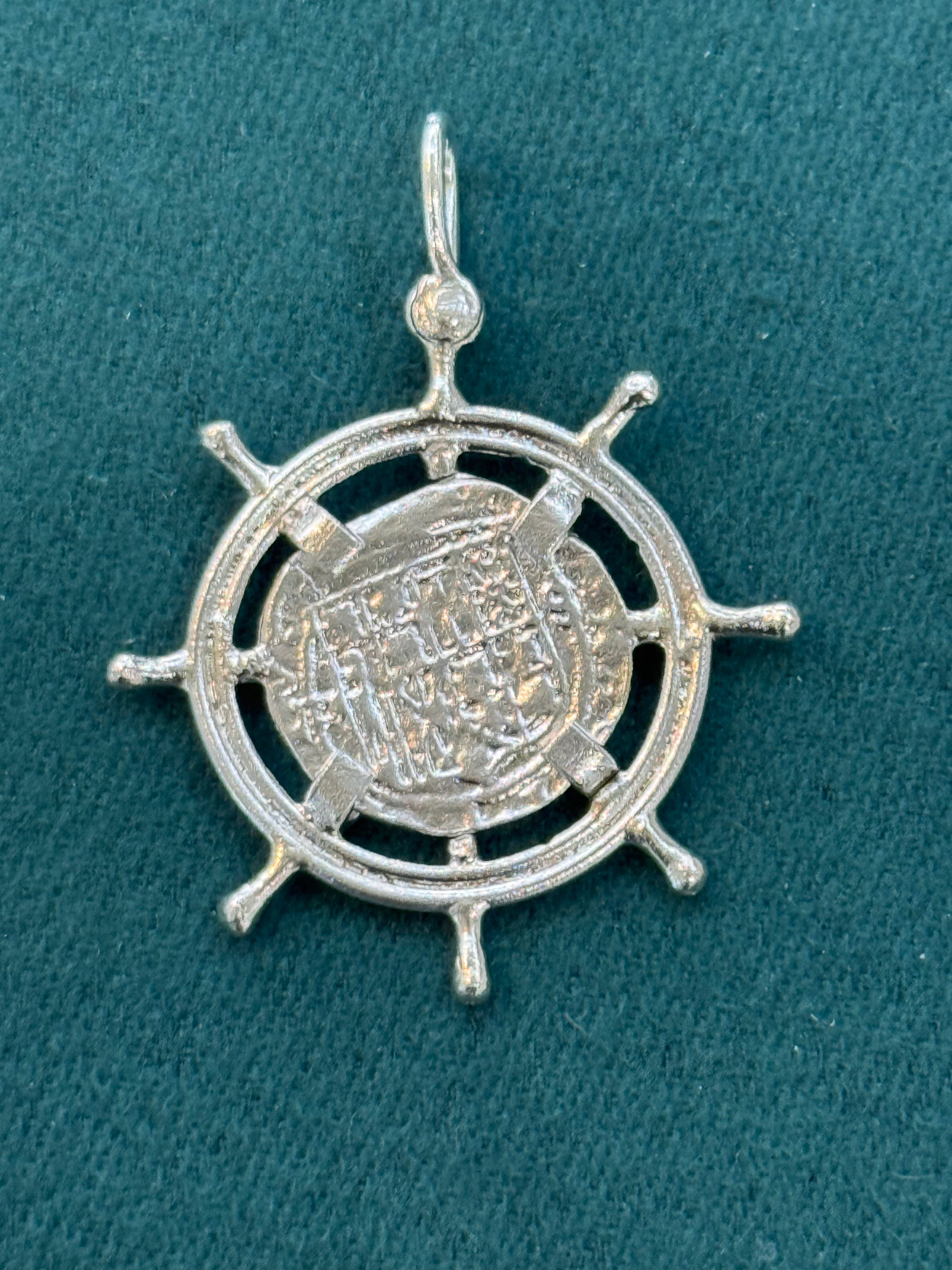 ATOCHA SILVER SHIPS-WHEEL COIN PENDANT