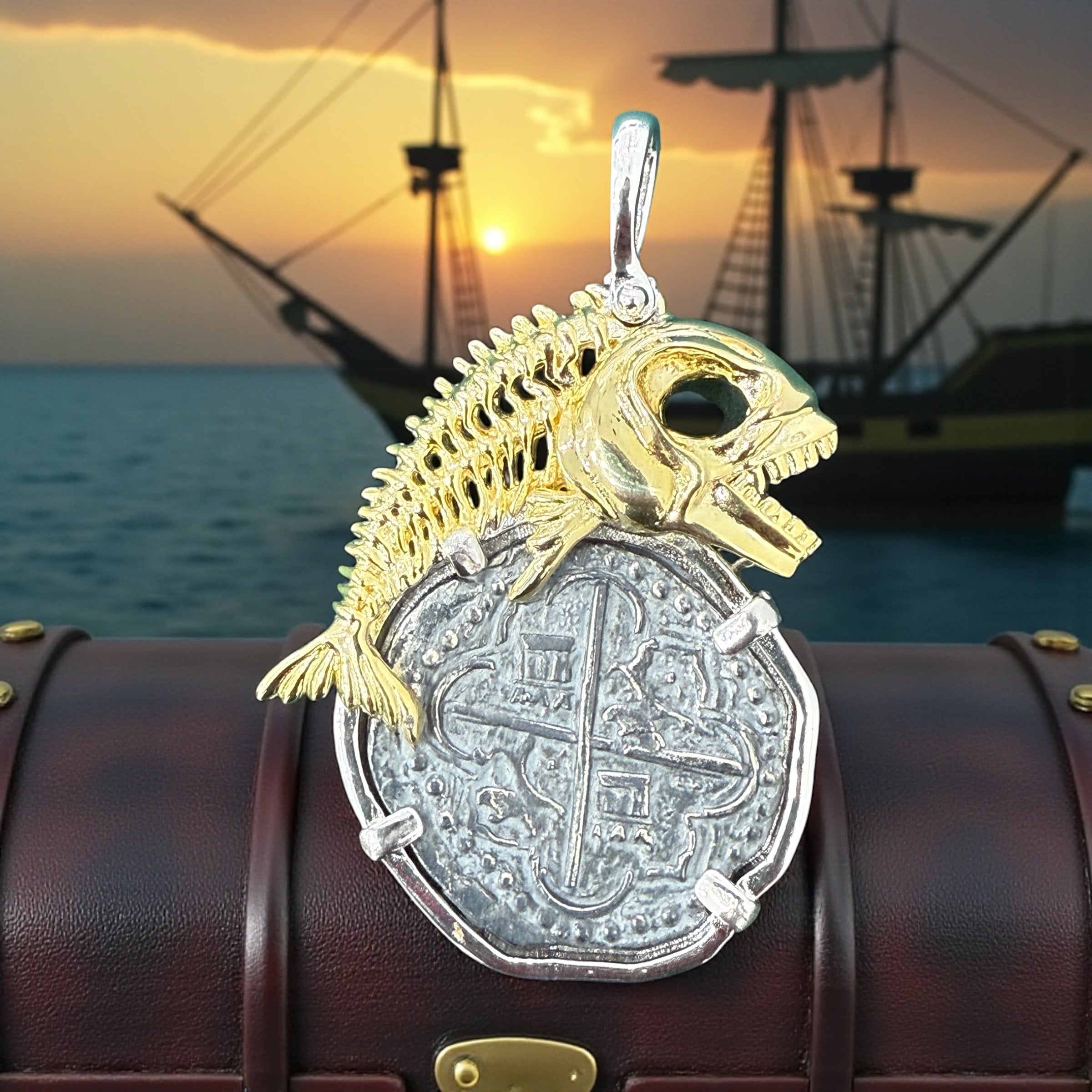 Atocha shipwreck large size silver coin pendant in beautiful hook rope bezel and 14k gold vermeil fish setting on top