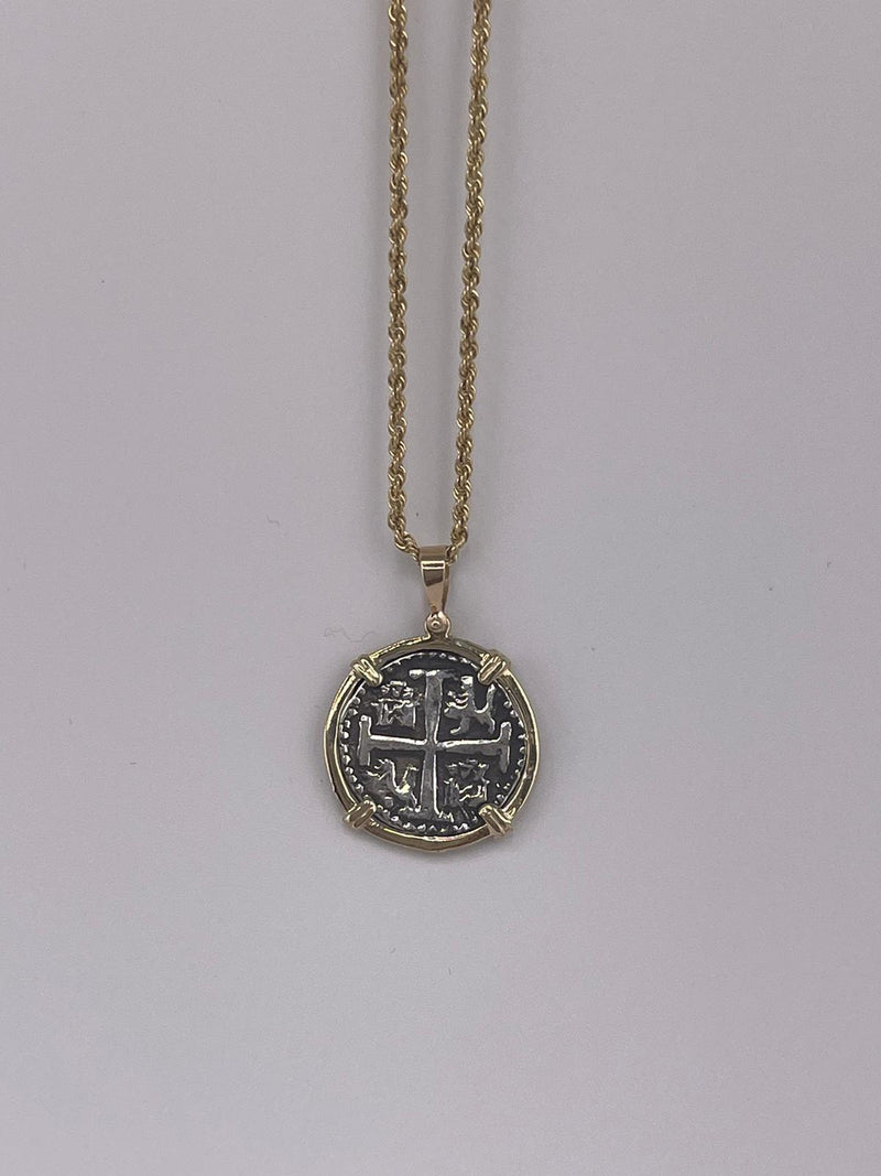 NUESTRA SENORA DE ATOCHA SILVER COIN PENDANT IN 14KT GOLD BEZEL